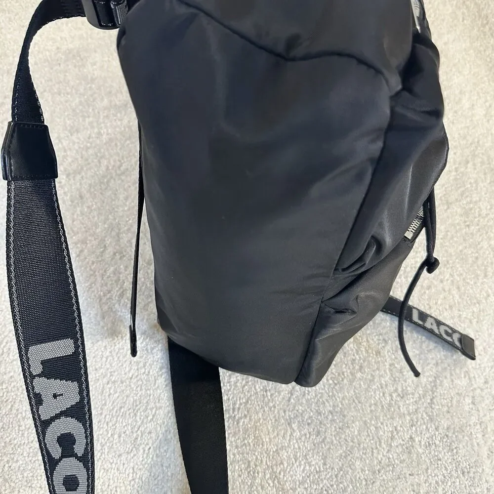 Lacoste Women's Solid Black Cinch Flap Nylon Bag Backpack